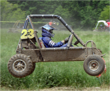 Car #23 catching air during the competition